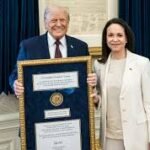 Venezuelan oppn leader Machado presents Nobel medal to Trump at White House Display